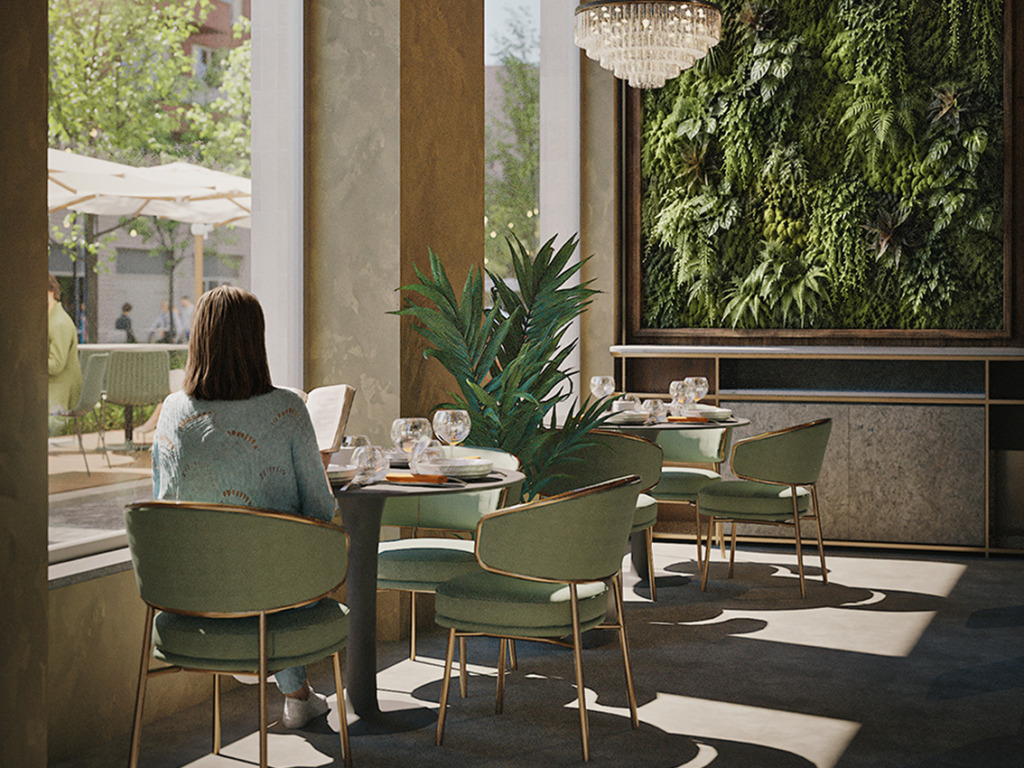 Visualization of a restaurant with green upholstered chairs, a plant wall and a chandelier